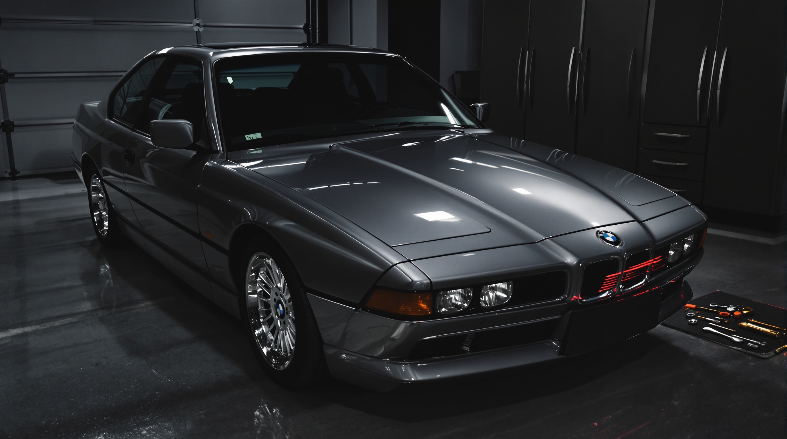 BMW E31 850i V12 garage passionné carnet entretien outils ambiance exclusive