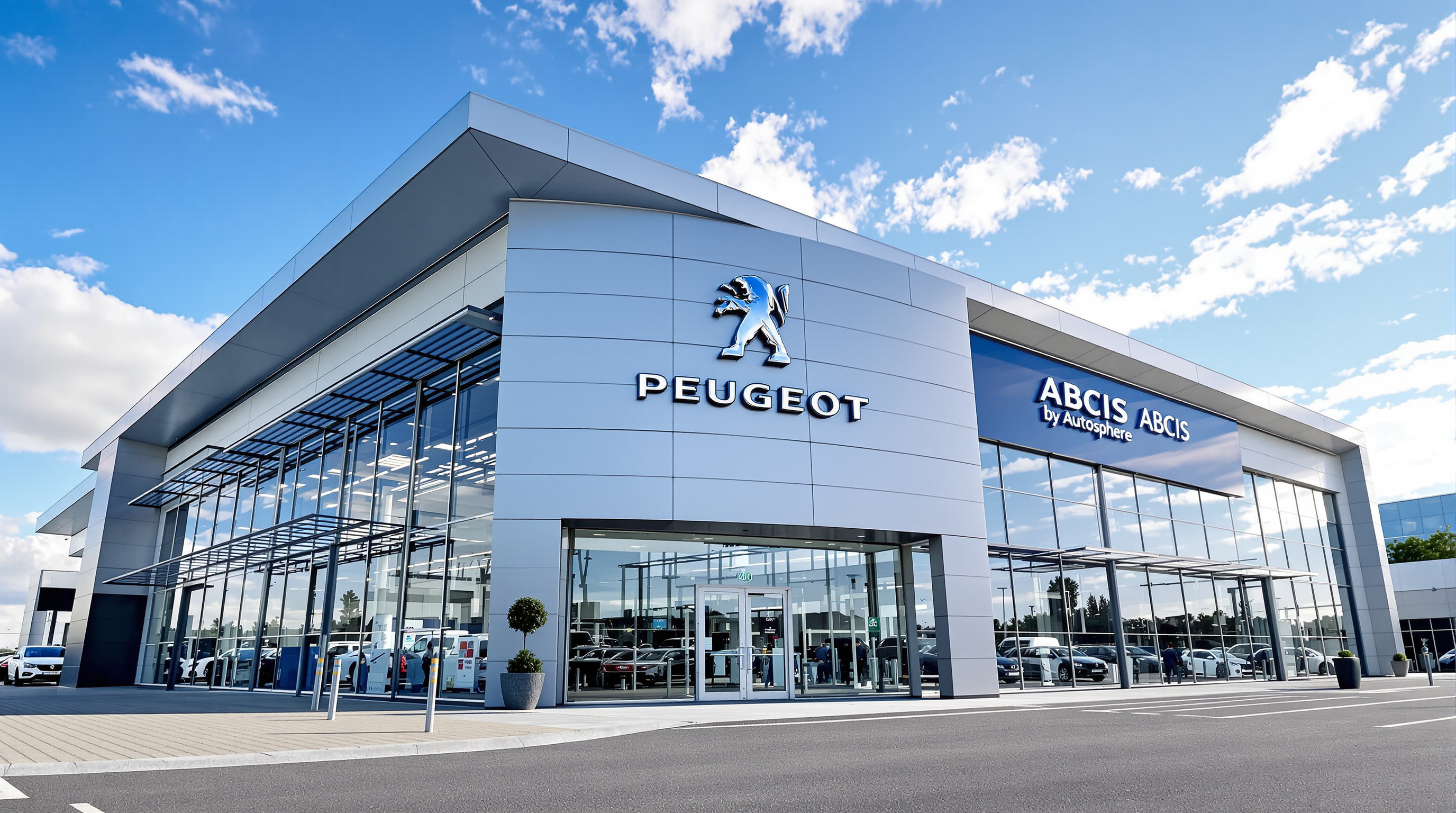 Façade imposante de la concession Peugeot Abcis by Autosphere à Clermont-Ferrand, logo Peugeot bien visible, ambiance gros centre officiel.